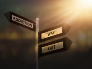 sign leading the way out of drug addiction