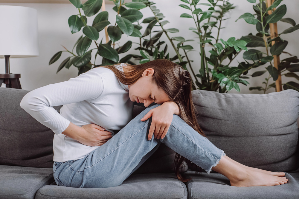 woman dealing with pain during PAWS - post acute withdrawal syndrome